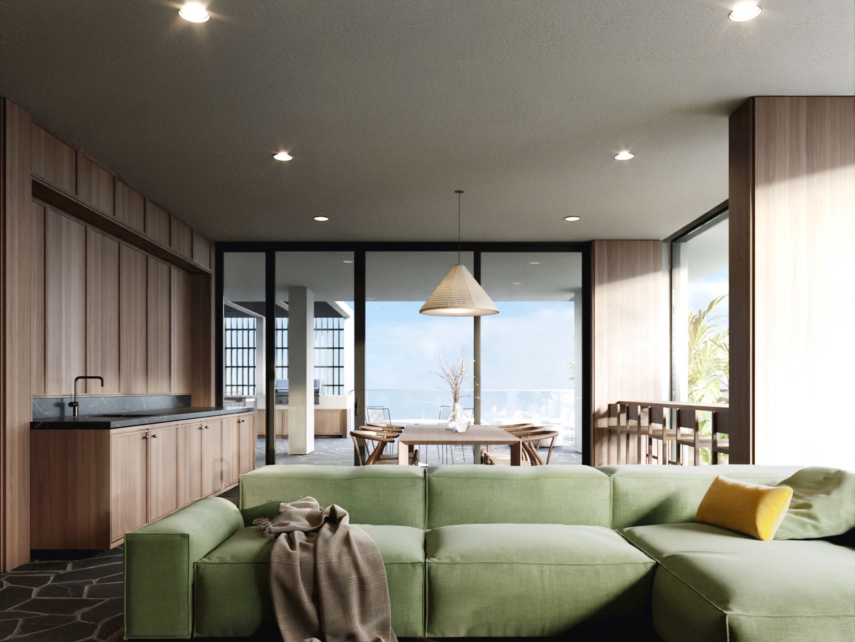 Rendering of the lounge: a deep green sectional facing glass doors that open to a terrace table and the sky